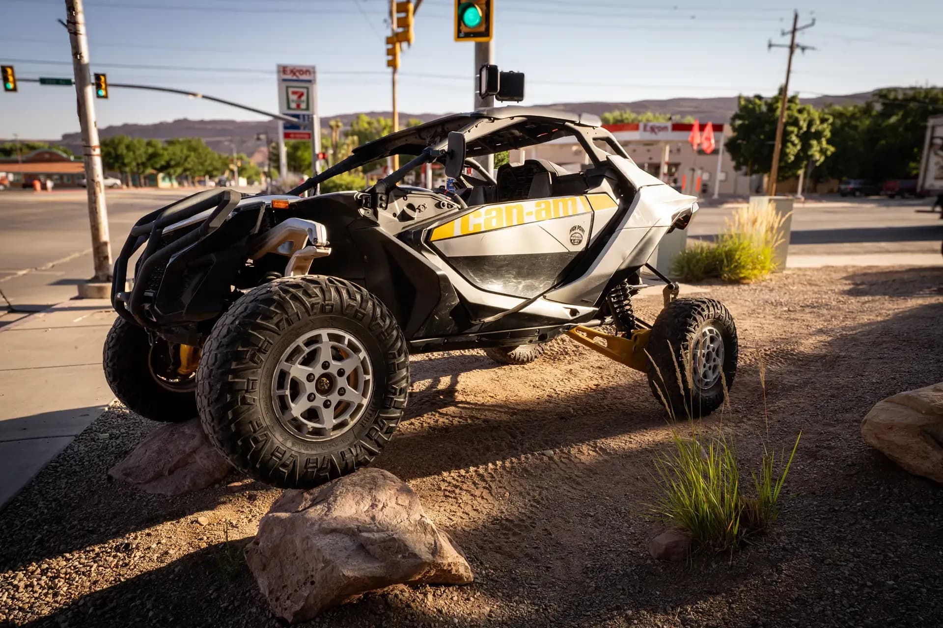 Can-Am Maverick R parked at the High Point Hummer lot on Main Street in Moab at sunset