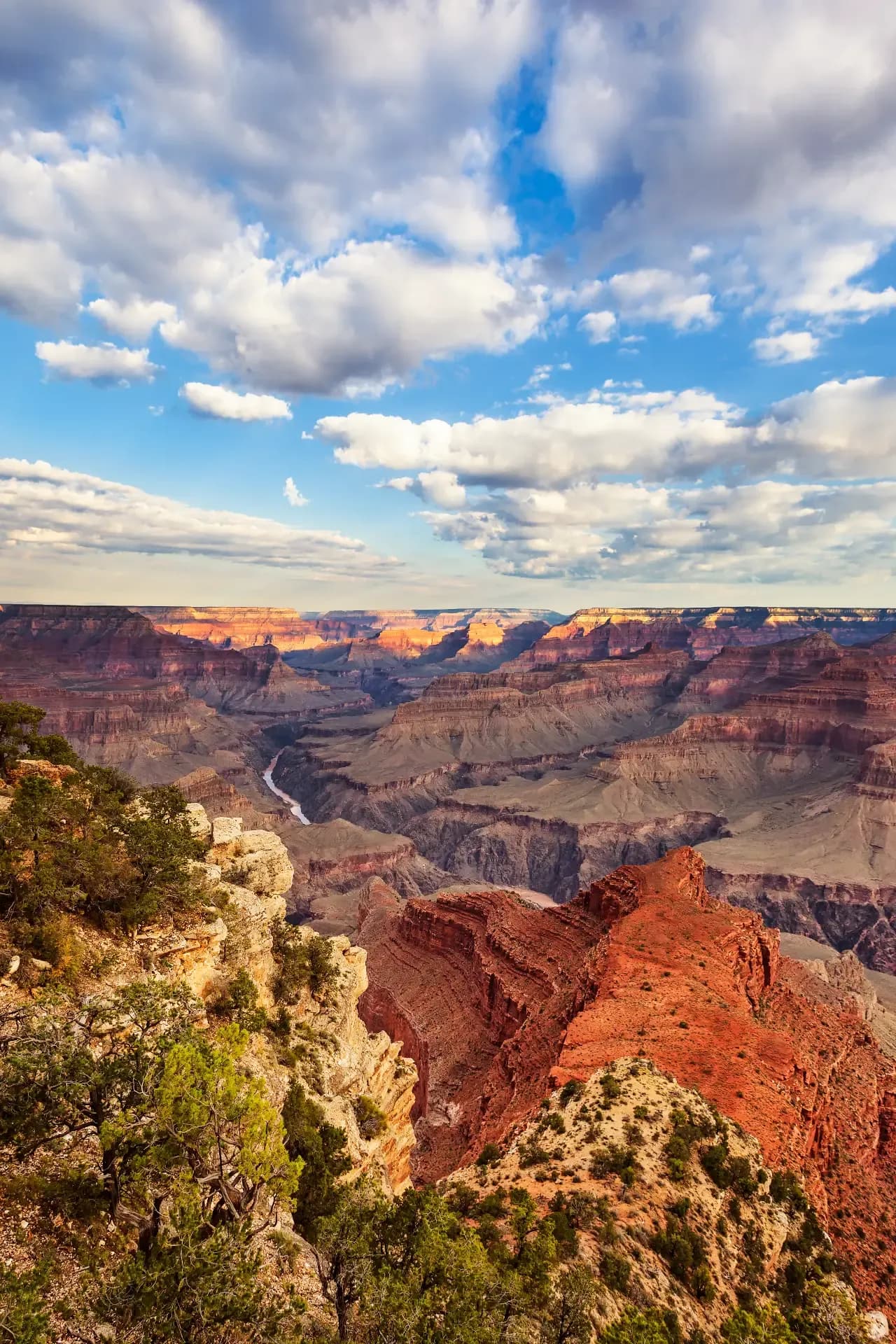 Overlook view of a river winding through layered desert canyon walls