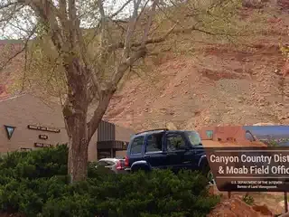 Canyon Country District and Moab Field Office sign outside the BLM office in Moab